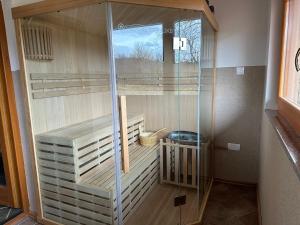 a glass shower in a bathroom with a toilet at Gorski kotar , Kuća za odmor Kratohvil in Lukovdol