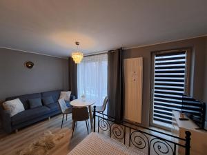 Posedenie v ubytovaní Apartament Kryształowy