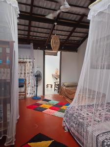 Postel nebo postele na pokoji v ubytování Mamisa Café, Home stay