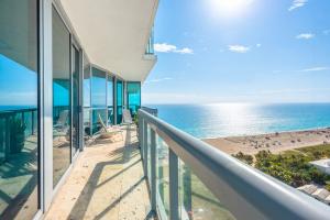 an oceanfront balcony with a view of the beach at THE SETAI 5 STARS HOTEL-RESIDENCE MIAMI BEACH OCEANVIEW 2 Bedroom UNIQUE in Miami Beach +82 photos