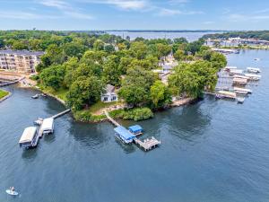 an aerial view of an island in a body of water at The Lakeside Lookout on Gingles Point in Arnolds Park