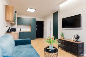 Kjøkken eller kjøkkenkrok på Witkacy Apartament