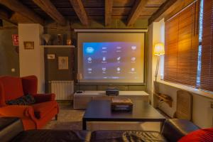 TV a/nebo společenská místnost v ubytování Adrados Mar de Pinos