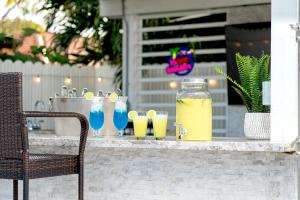 a group of drinks sitting on a table at Heated Pool Family Retreat- Games, Everglades, Keys in Miami