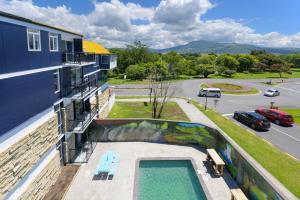 a swimming pool on the balcony of a building at Urban Lounge Sleepery, SureStay Collection by BW in Rotorua