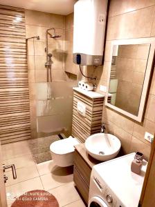 Kúpeľňa v ubytovaní Apartman Roso + 20 fotografií