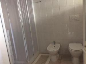 Koupelna v ubytování Hotel Edera