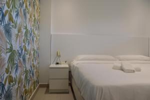 Postel nebo postele na pokoji v ubytování Albir Beach Apt