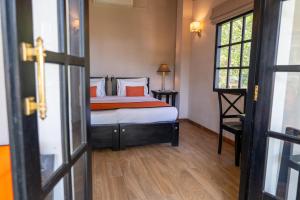 Tabula Rasa Resort & Spa客房内的一张或多张床位