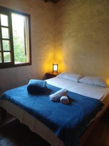 Cama o camas de una habitación en Casa Morango