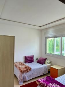 En eller flere senger på et rom på Beautiful apartment in the heart of Tetouan
