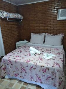 Cama ou camas em um quarto em Pousada Klein