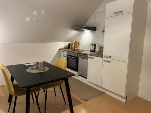 Eldhús eða eldhúskrókur á Gemütliche Garconniere im Zentrum von Pregarten +1 mynd