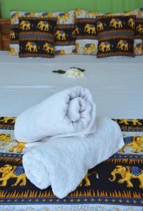 Postel nebo postele na pokoji v ubytování Golden Lodge Tangalle