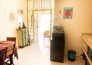 Kuchyň nebo kuchyňský kout v ubytování Casa Chaak Maya - Estudio privado con alberca en Mérida