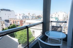 En balkon eller terrasse på Alucinante studio! Centrico Moderno con balcon, apto 3 personas 71