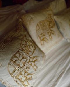a close up of henna designs on a bed at Casa Grimaldo in Valle de Anton