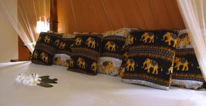 Postel nebo postele na pokoji v ubytování Golden Lodge Tangalle