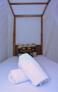 Postel nebo postele na pokoji v ubytování Golden Lodge Tangalle