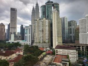 a view of a city with tall buildings at Vortex Suites KLCC by Fortune in Kuala Lumpur