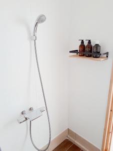 a shower with a shower head in a bathroom at Private Garden The West - Vacation STAY 41967v in Ōhara