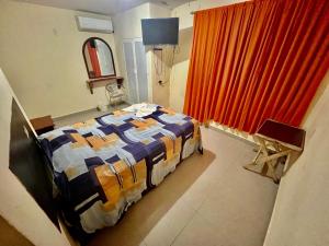 Katil atau katil-katil dalam bilik di Hotel Puerto Real-Minatitlán