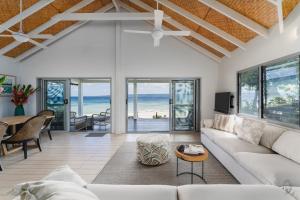 a living room with a couch and a table at Solwota Sands in Port Vila