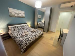 Posteľ alebo postele v izbe v ubytovaní Colour House