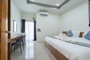 T-OneHome客房内的一张或多张床位