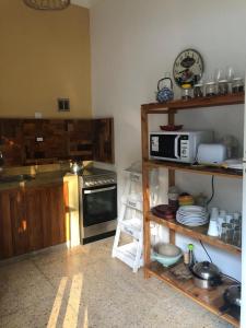 Kuchyň nebo kuchyňský kout v ubytování Eco Boutique San Fernando