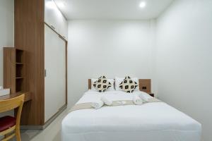 T-OneHome客房内的一张或多张床位