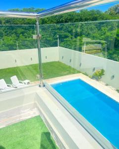 una imagen de una piscina en una casa en 5 Star Villa minutes from Airport and Beaches, en Sosúa