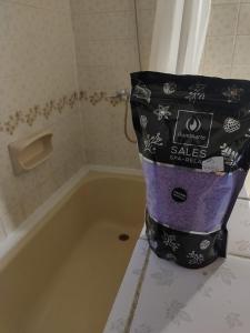 a bag sitting on top of a bath tub at Ananda in Ushuaia