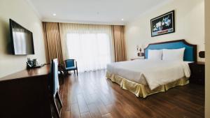 Postel nebo postele na pokoji v ubytování CALYSSA HOTELS & VILLAGE