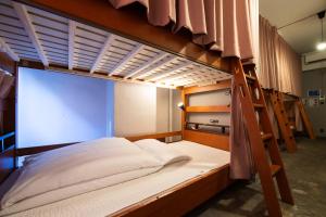 Postel nebo postele na pokoji v ubytování Imano Tokyo Hostel