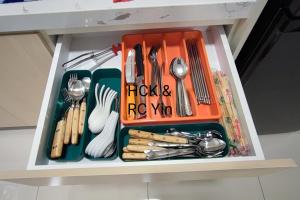 a drawer filled with utensils and utensils at Lovely Family Suites at Razak City Residence KL by HCK in Kuala Lumpur
