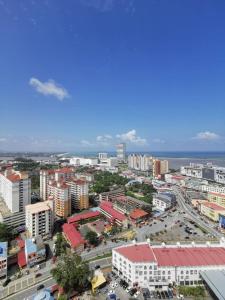 an aerial view of a city with buildings and cars at Sky Palace Kuala Terengganu in Kuala Terengganu