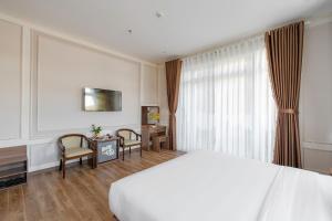 TV a/nebo společenská místnost v ubytování PINE VIEW Hotel Dalat