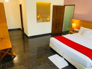 Voodi või voodid majutusasutuse Peppervine Hotel toas