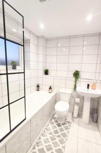 Kylpyhuone majoituspaikassa Sigma Lux Home