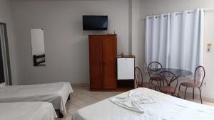 Llit o llits en una habitació de Hotel Turazzi