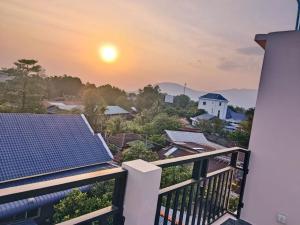 a view from the balcony of a house with solar panels at NM Homestay in Kampot