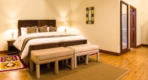 The Residences at Karen客房内的一张或多张床位