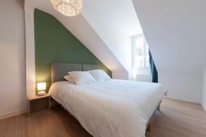 Postel nebo postele na pokoji v ubytování Le Cordelier - Hyper central - Au calme - Wifi