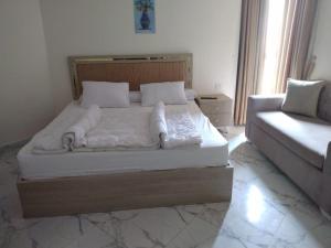 Кровать или кровати в номере porto said resort