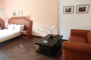 Postel nebo postele na pokoji v ubytování Dreams Suites