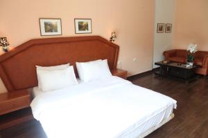 Postel nebo postele na pokoji v ubytování Dreams Suites