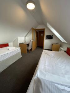 Postel nebo postele na pokoji v ubytování Hotel PAYER