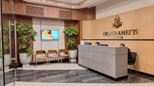 TV a/nebo společenská místnost v ubytování Grand Ametis Hotel Jakarta