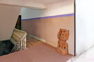 Postel nebo postele na pokoji v ubytování Super OYO 16535 Chilika Residency